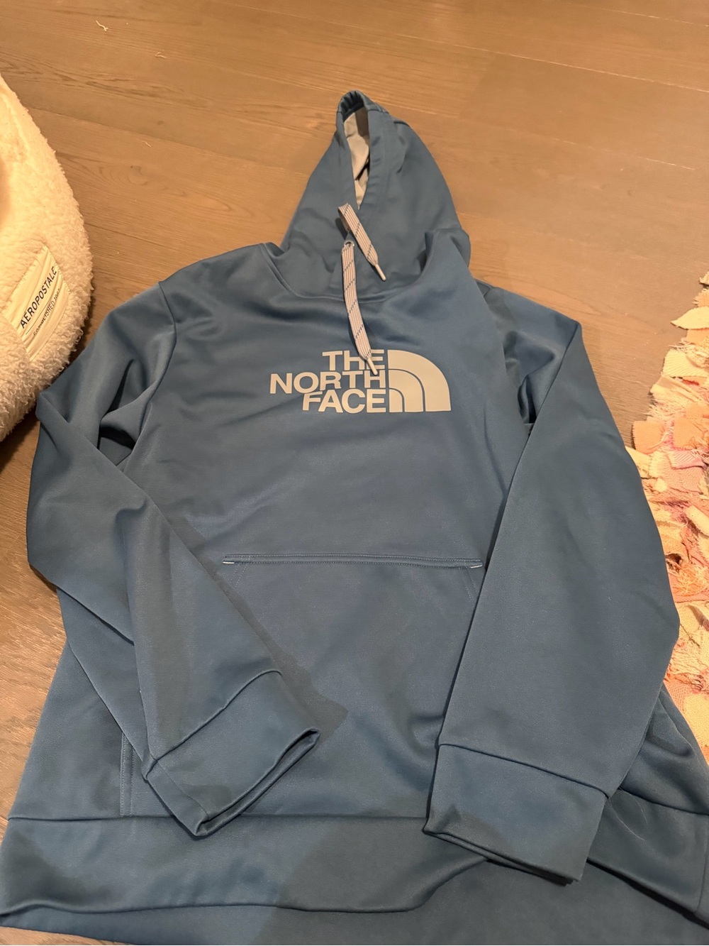The North Face Men's Blue Hoodie with White Logo